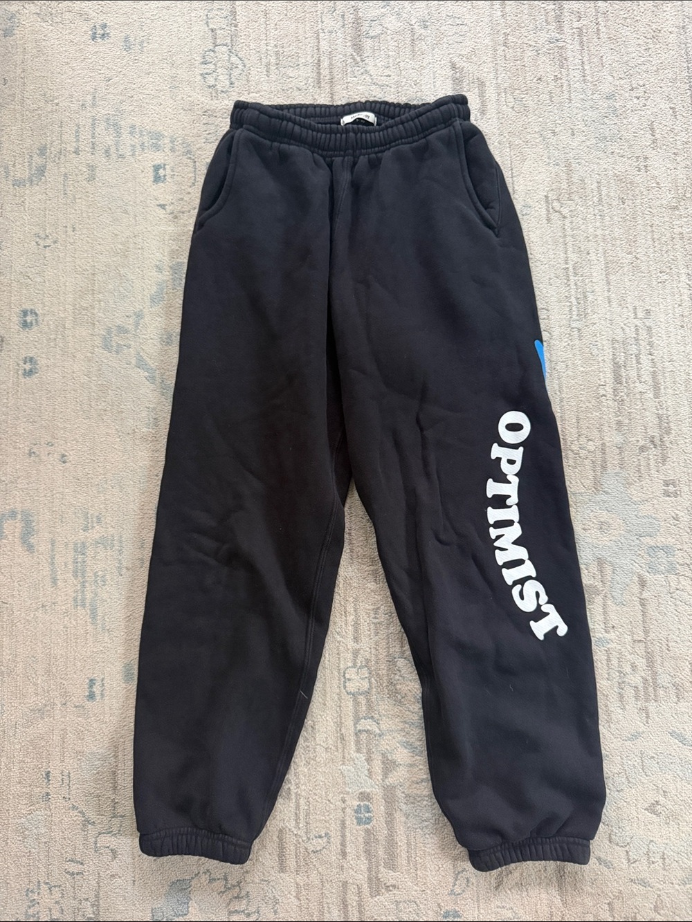 Madhappy Black Joggers with White 'OPTIMIST' Lettering